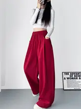 ブラックのフィットワイドレッグパンツ【春季用・カジュアルスタイル・フロアロング】