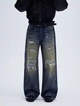 ウォッシュド・泥染め加工のデニムパンツ【破れ補修・アシンメトリーデザイン・ワイドストレート】（セットアップ対応）