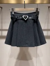 春の新作！キラキラ蝶結びニットトップスとプリーツスカート【学院風・チュニックスタ  イル】（セットアップ対応）