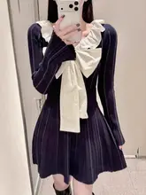 可愛いフリルデザインのリボン付きニットトップスとフレアスカート（セットアップ対応）