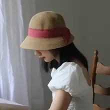 可愛らしいリボン付きのラウンドトップ草帽【折りたたみ可能・ハクト風・おしゃれな編みデザイン】