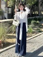 高級感あふれる春の女性用コーディネート【フレアスリーブ・ハイウエストワイドパンツ・飾りリボン】（セットアップ対応）