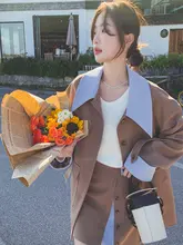 洗練された印象の女性用スーツ【春秋向け・ショートスカート・2点セットアップ対応】