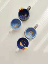 北欧風浮彫りデザインの手作り陶器マグカップ【星球モチーフ・個性的】