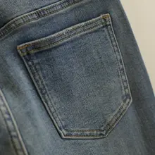 愛心ボタン付きスリムフィットデニムパンツ【毛羽立ち裾・サイドスリット・春用】（セットアップ対応）