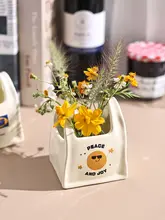 笑顔デザインの陶器製箸立て【持ち手付き・カトラリー収納用】