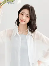 フレンチスタイルの立体的な蝶結びデザイン青色キャミソールワンピース【夏用・美しいシルエット・UVカット】（セットアップ対応）