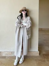 オートミールカラーのニットカーディガン【ゆったりとしたデザイン・膝下丈・春用】