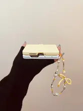 春の小雛菊デザインの折りたたみ式スマホケース【創意回転花デザイン・対応機種多数】