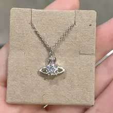 シンプルなデザインのサターンモチーフペンダントネックレス【ダイヤモンド付き・通勤用・ロックカラー】