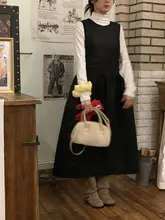 背中がリボンデザインのウエストシェイプAラインキルティングワンピース【ノースリーブ・ミディ丈・プリンセススタイル】