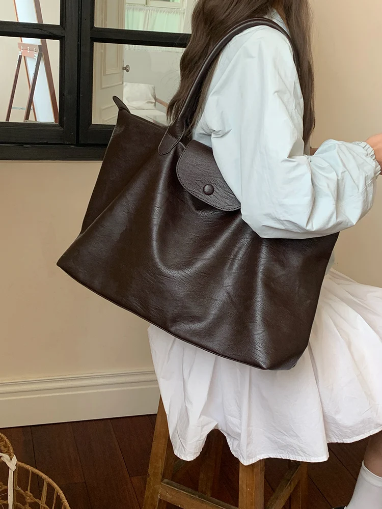 大容量トートバッグは洗える設計で通勤・旅行に最適な実用性を実現