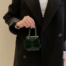 優雅なリボン付きハンドバッグスタイルのスマートフォンケース【折りたたみ式・防衝撃・高級感】