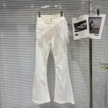 トレンドの流行にぴったり！トッパー刺繍デザインのフリンジ付きデニムパンツ【フレア・レディース】