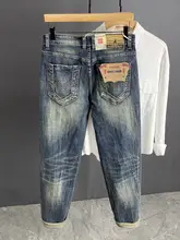 ビンテージ風ブルーの穴あきデニムパンツ【メンズ・ゆったりストレート・秋冬カジュアル】