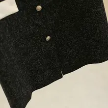 気品あるゆったりシルエットのワンピース【半袖・黒・細見え効果】