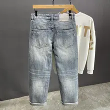 グレーのビンテージ風ダメージデニムパンツ【メンズ・ルーズフィット・秋用】