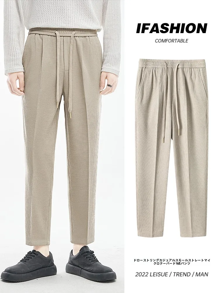 カーゴパンツ メンズ コーデ - 九分丈テーパードシルエットと絞り紐の機能的特徴