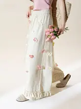 立体花飾りのレースワイドパンツ【春向け・アプリコット色・甘いフリル付き・スタイル】