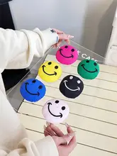 充填された笑顔デザインのマグネット式スマホスタンド【吸着式・伸縮・回転対応】
