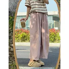 感のある白色のロングパンツ【夏用・ゆったりシルエット・カジュアルスタイル】（セットアップ対応）