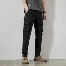 バイカラーデザインの黒い作業パンツ【スタイリッシュ・ストレートシルエット・多ポケット】