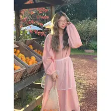 赤いチェックのワンピース 女性 秋の ゆったりし ランタンスリーブ 重ね着