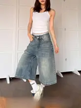 水洗い加工の折り目入り七分丈デニムパンツ【ユニセックス・クリーンフィット・ゆったりワイド】