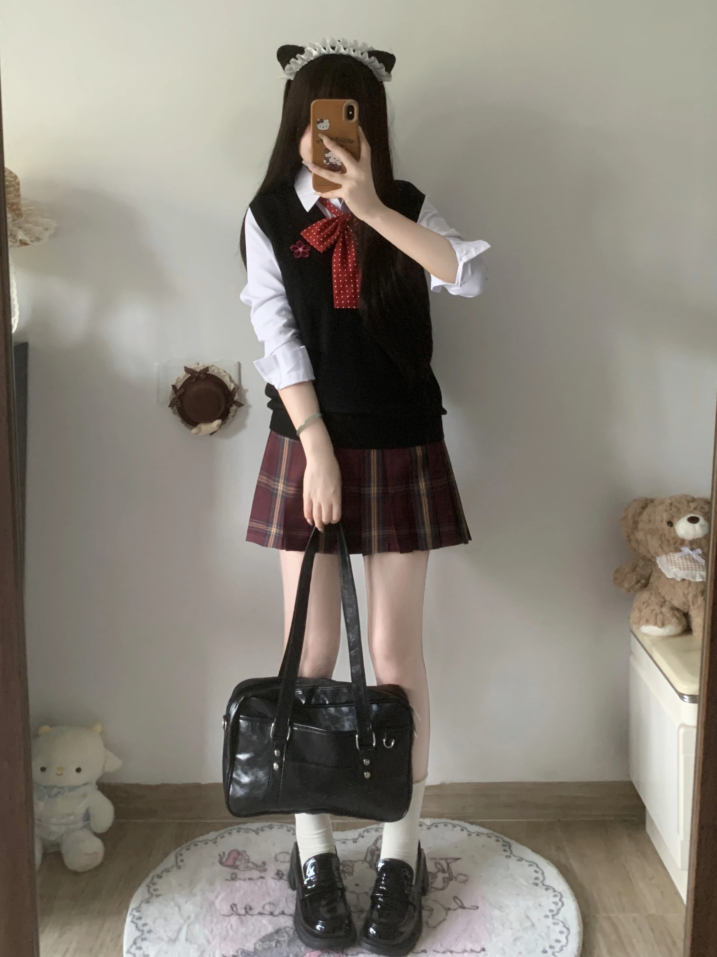 黒色のJKスタイルニット ベスト：可愛さと機能性を兼ね備えた女子高校生向け春秋用アイテム