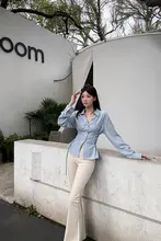 エレガントなデザインのリボン付きポロカラーシャツ【ウエストマーク・長袖・女性用】
