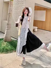 提花デザインのフリル付きブラウスとスカートパンツ【夏用・高級感あるファッション・カジュアルスタイル】（セットアップ対応）
