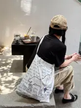 復古デザインのレタープリントキャンバスショルダーバッグ【米白・通勤向け・ラフスタイル】