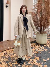 デザイン性のある優しい印象のプリント蝶結びスーツスカート【秋用・二分丈】（セットアップ対応）