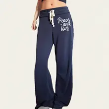 アメリカンヴィンテージ風ブルーリボン付き字母プリントニットパンツ【スポーツスタイル・ゆったりストレート】