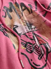 カートゥーンプリントのルーズフィット短丈フード付きジップカーディガン【長袖・レディース・秋用】（セットアップ対応）