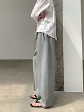 シンプルなドレープのカーブパンツ【男女兼用・カジュアル・ルーズフィット】（セットアップ対応）