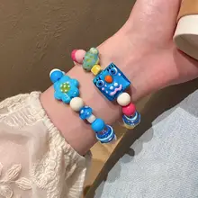 カラフルな陶器製 カートゥーンフラワーチャームブレスレット【個性的・ハートモチーフ】