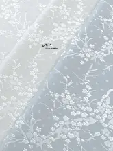 デザイン性の高い梅花柄生地のブルーグレーコート【抗皺・中国風・ファッション】
