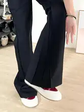 リラクシングブレンドのブラックフレアパンツ【足長効果・低ウエスト・カジュアル】（セットアップ対応）