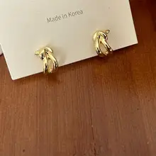 A.MU 結びデザインのメタル風イヤリング【通勤用・シンプル・ノンホール】