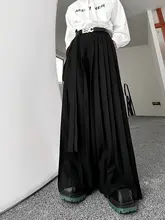 暗黒系デザインのリボン付きカジュアルパンツ【プリーツスカート風・ルーズフィット・スタイリッシュ】（セットアップ対応）