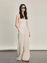 デザイン性の高いリネン素材の女性用トップスとワイドパンツ（セットアップ対応）