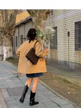 Northage カーキベージュカラー スタンドカラーのスリーブレスワークコート【カジュアル・ショート丈】