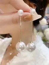 波西米ア風のロングパールイヤリング【シンプルで洗練されたデザイン】