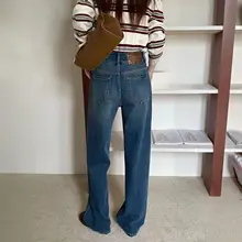高腰デザインのブルージーンズ【ダブルボタン・スリムフィット・ワイドレッグ】（セットアップ対応）