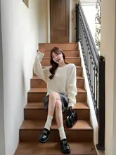 リボンデザインのゆったりとしたニットセーター【女性用・秋冬・クルーネック・独特なデザイン】