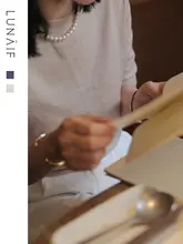 上質な山羊毛丸首半袖ニット