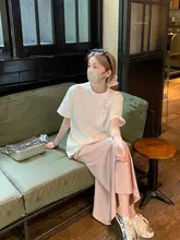 夏にぴったりなピンクのアセテートサテンのハイウエストスカート【優雅なAライン・ドレープ感】