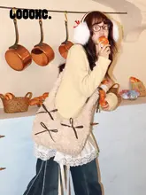 可愛らしい蝶結びデザインの大容量ショルダーバッグ【フワフワ素材・豆乳の巻き毛】