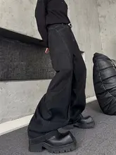 個性派デザインのワイドレッグカジュアルデニムパンツ【プレスト加工・フレア・ロング丈】